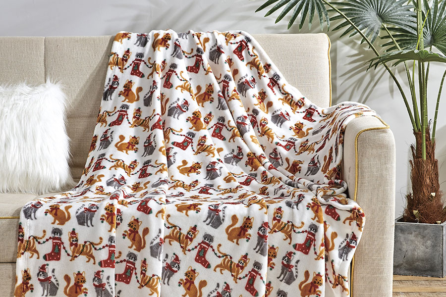 Can Flannel Printed Blanket be washed in warm water?